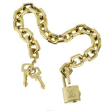 An 18k yellow gold Padlock bracelet with original box by Louis