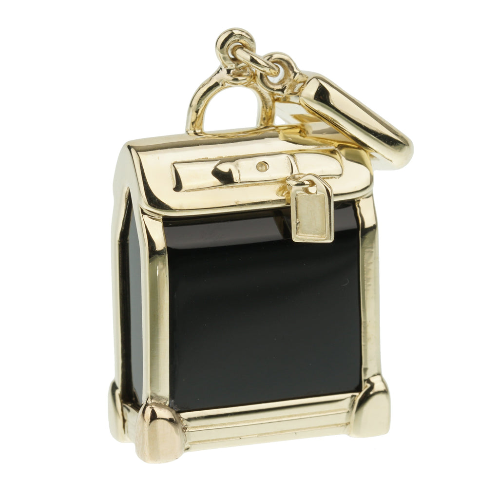 Louis Vuitton 18k White Gold Charm Bag & Box Auction